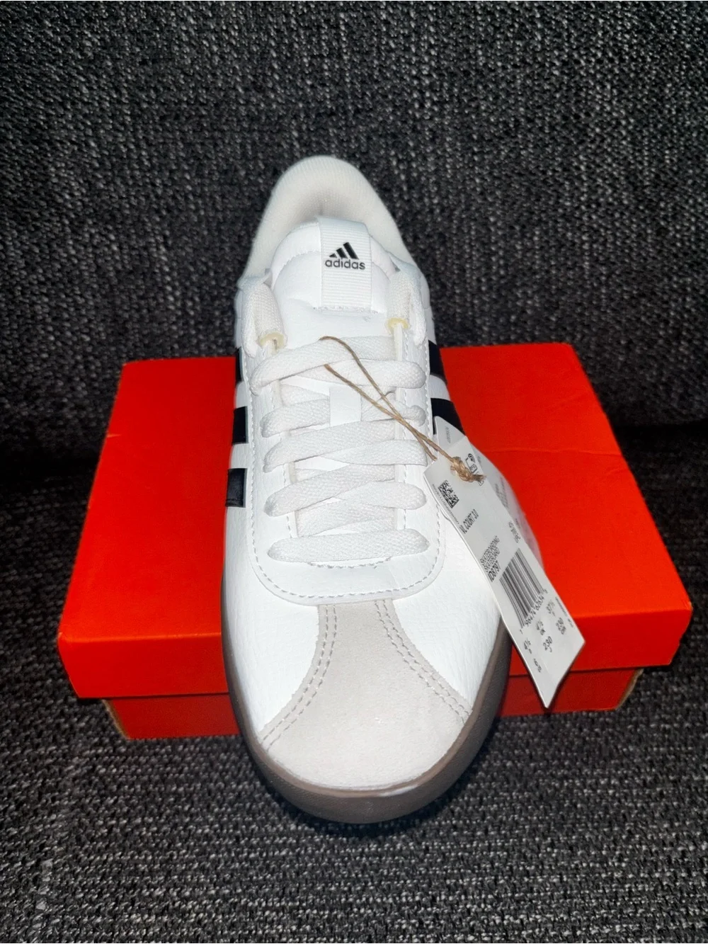 Adidas unisex White Sneaker with Black Stripes